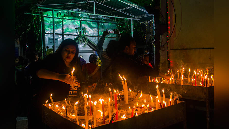 Devotes light candles at Emmanuel Church