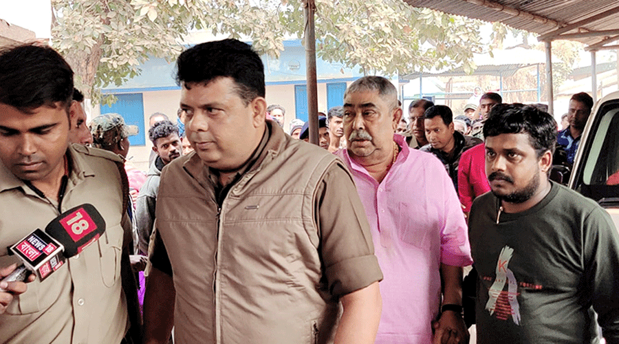 Anubrata Mondal (in pink kurta) arrives at the court in Birbhum’s Dubrajpur on Tuesday.