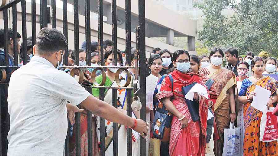 TET candidates enter the head office of the West Bengal Board of Primary Education in Salt Lake on Tuesday.