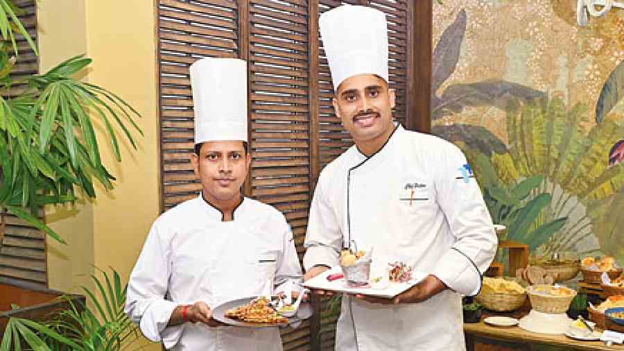 Rabindranath Mondal (left) and Srijan Sil (right), chefs of Afraa, posed for t2, with their creations. Afraa showcased their best to the guests.