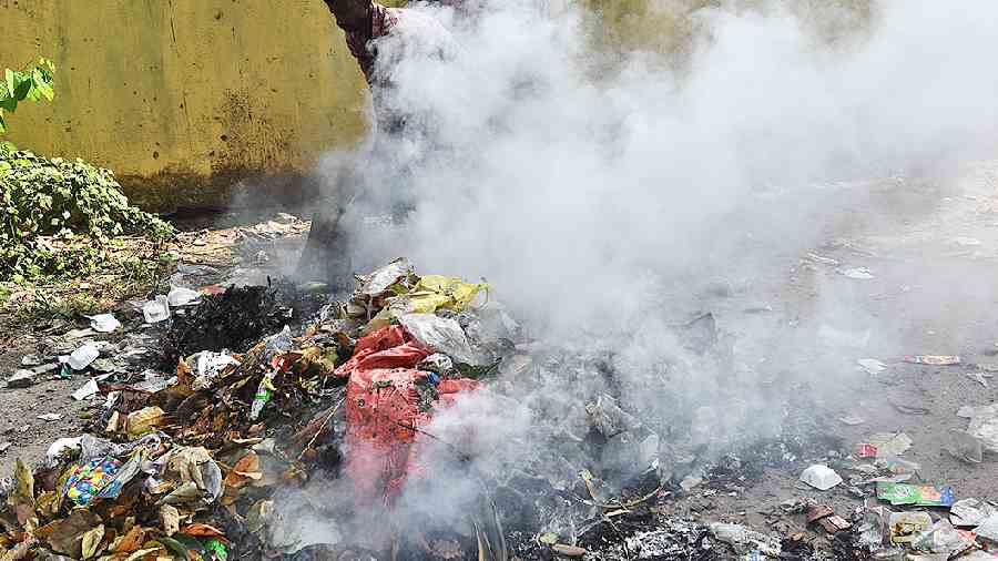Garbage set on fire near Prinsep Ghat. 