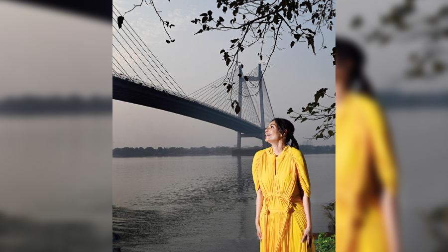 PRINSEP GHAT “We would come for walks by the river. We used to have a grand Lakshmi Puja and would go to the Ganges for immersion. Things were different. We could go into the water, sit and have an ice cream,” she looked back, her brilliant yellow dress complementing the setting sun.