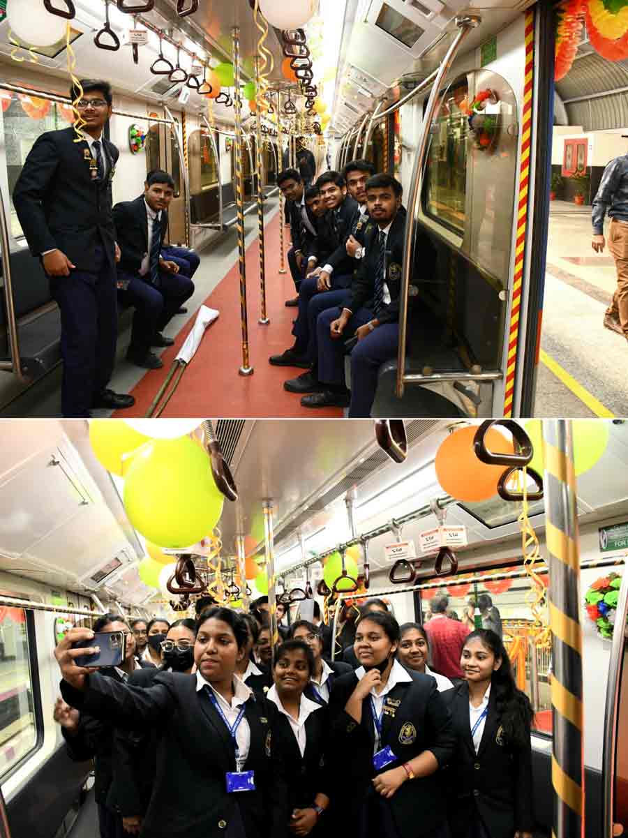 School children enjoy a Metro ride on the Joka-Taratala stretch of Purple Line