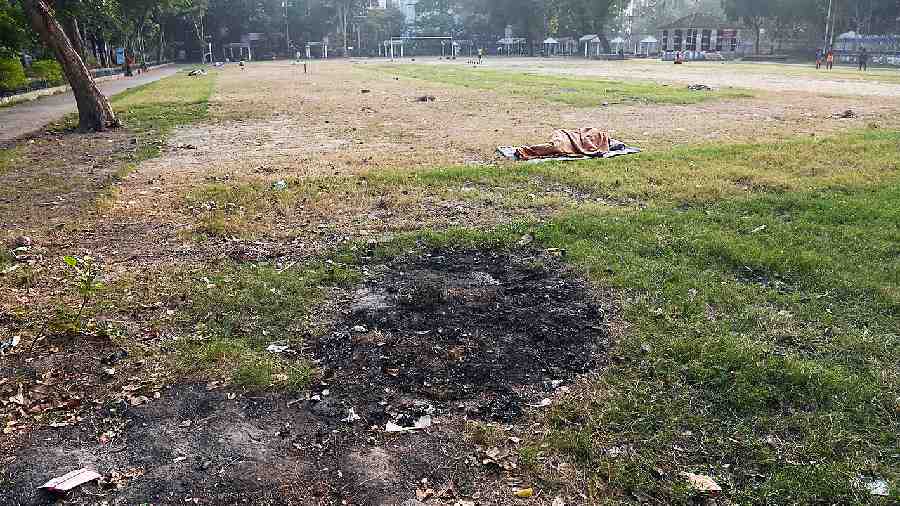 A burnt patch remains at Maddox Square even after the clean-up drive on Friday