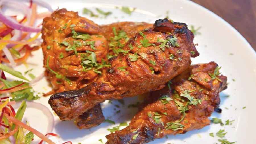The juicy and spicy Arabian chicken Burra Kebab is a drumstick kebab dish. It is marinated with Indian spices here to suit the palate along with cheese and yoghurt, and roasted in a tandoor, lending it a smoky flavour. Rs 300