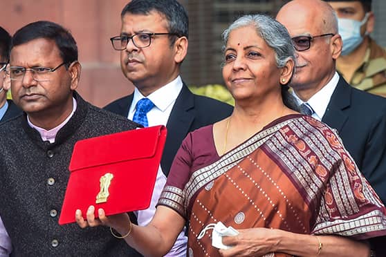 Union finance minister Nirmala Sitharaman holds a folder-case containing Budget 2022-23 as she leaves from the Finance Ministry, North Block, in New Delhi on February 1.
