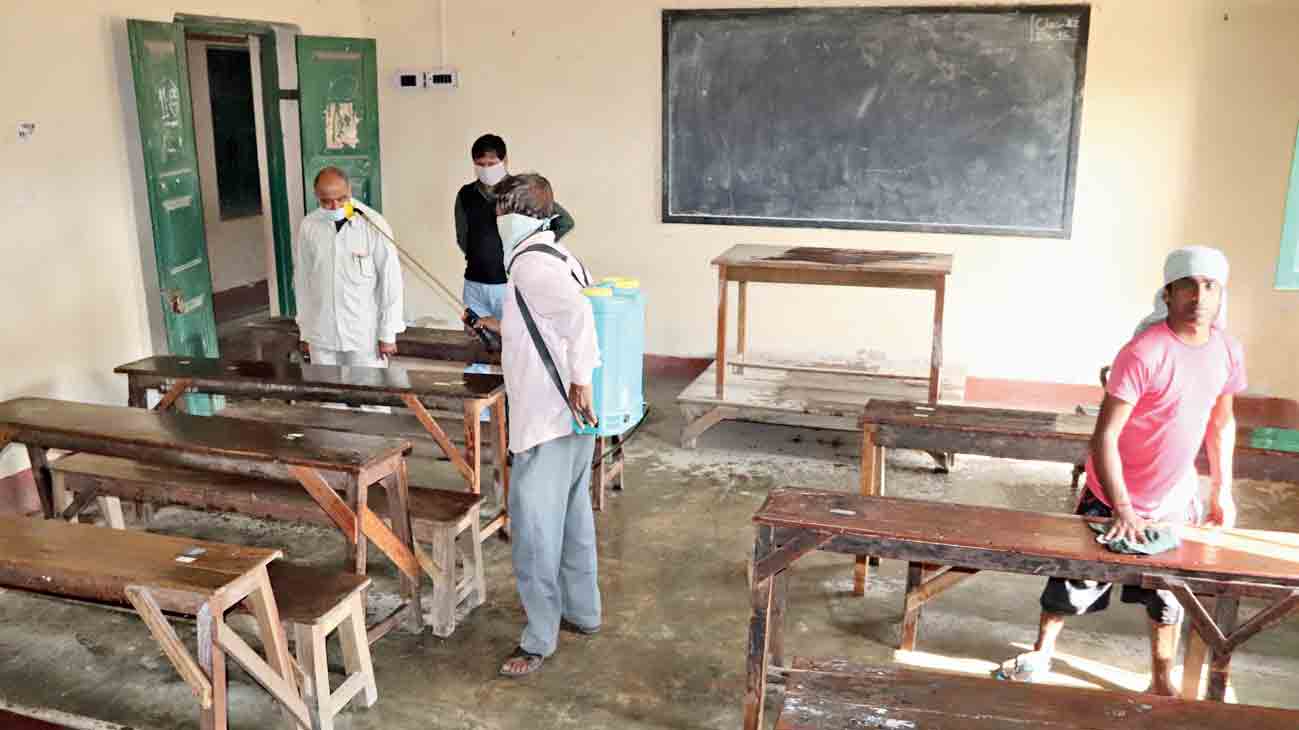 A classroom being sanitised at the Burdwan Municipal Boy’s School in Burdwan on Wednesday