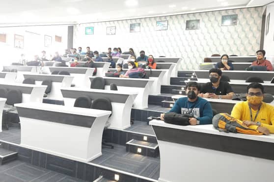Masked up students rejoin offline classes.
