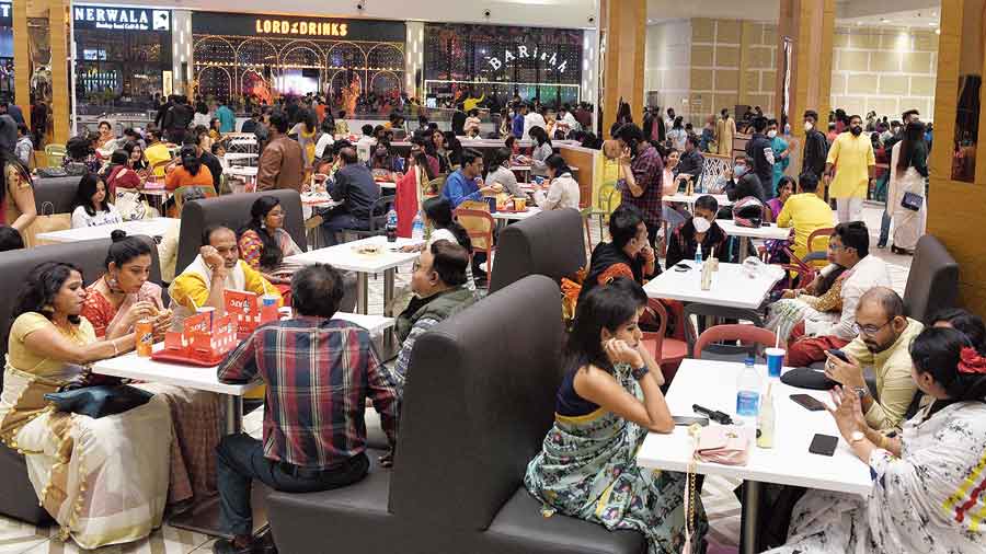The busy food court at South City Mall on Saturday  evening. 
