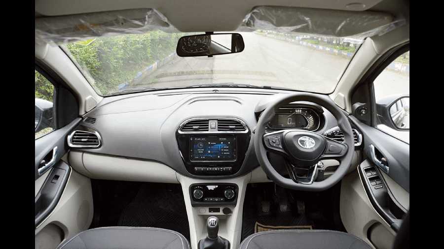 The grey and beige interior is quite smart and apart from a little switch marked ‘CNG’ on the dash, the only indication of the dual fuel are two fuel level indicators — for CNG and petrol — in the instrument cluster