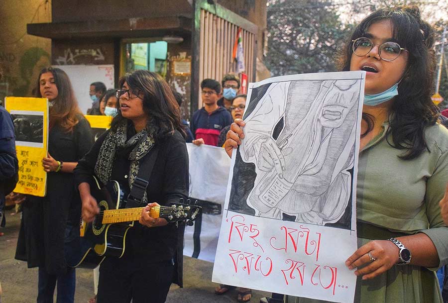 Students remember auteur film maker Ritwik Ghatak with songs, posters and a long walk at a rally in Jadavpur on his 46th death anniversary on Sunday