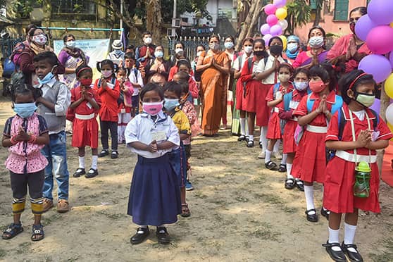 Pre-primary students offer prayers during morning assembly at a Paray Shikshalay facility decorated with balloons in Kolkata on Day-I of the campaign.