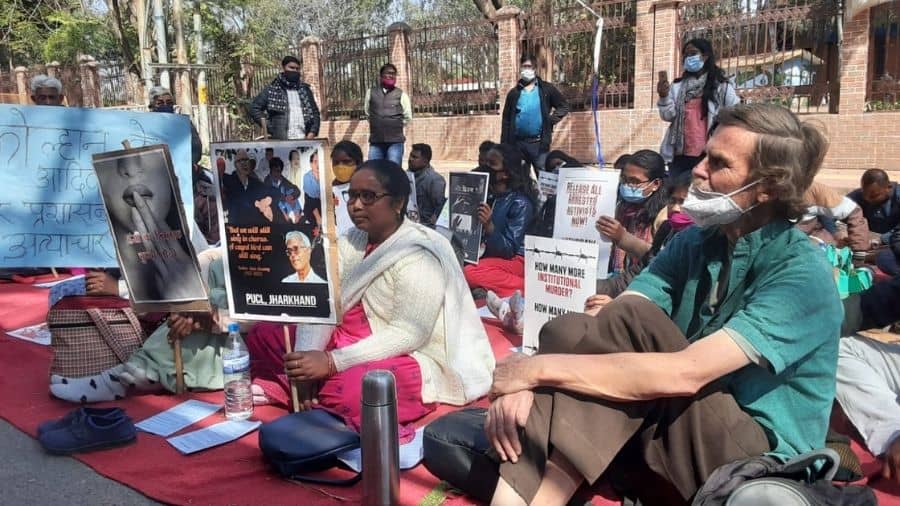 Activists and villagers from districts stage a demonstration near Raj Bhavan in Ranchi on Tuesday