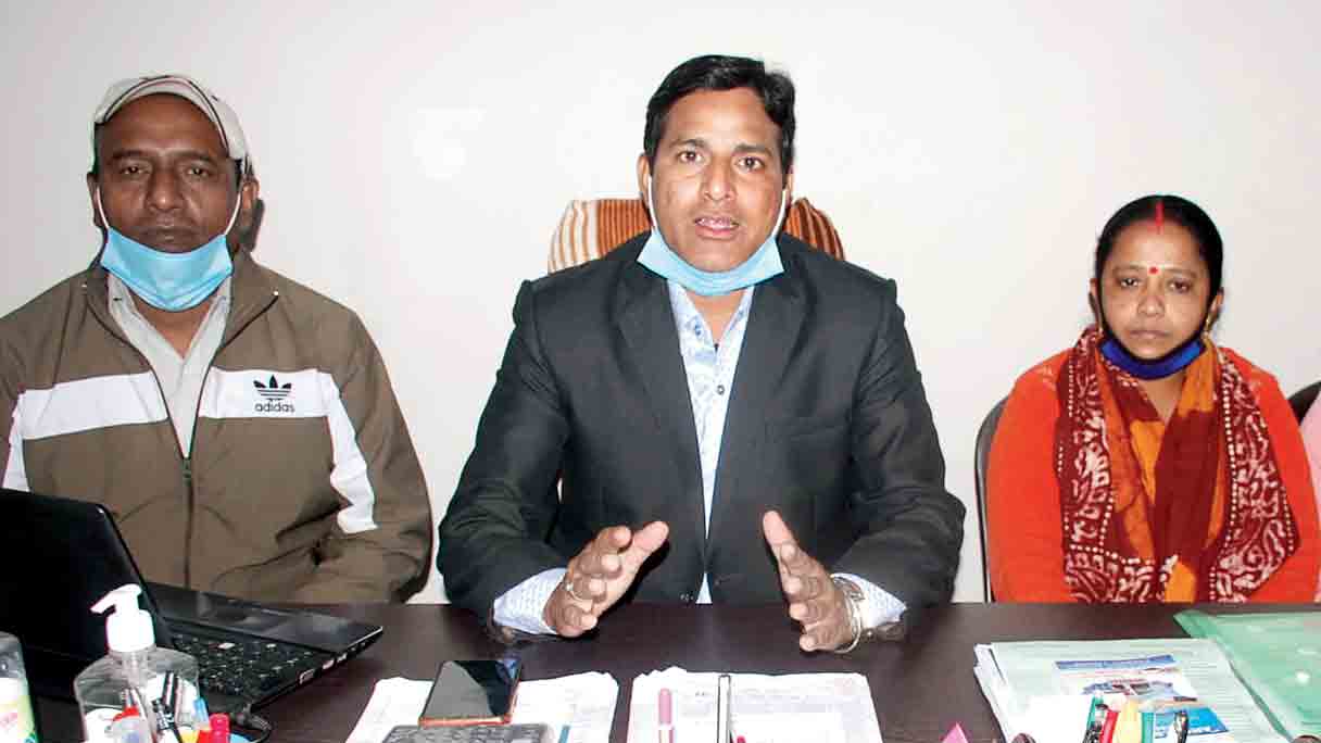 School principal M S Akhtar (M) announcing the fee waiver at Dhanbad on Tuesday