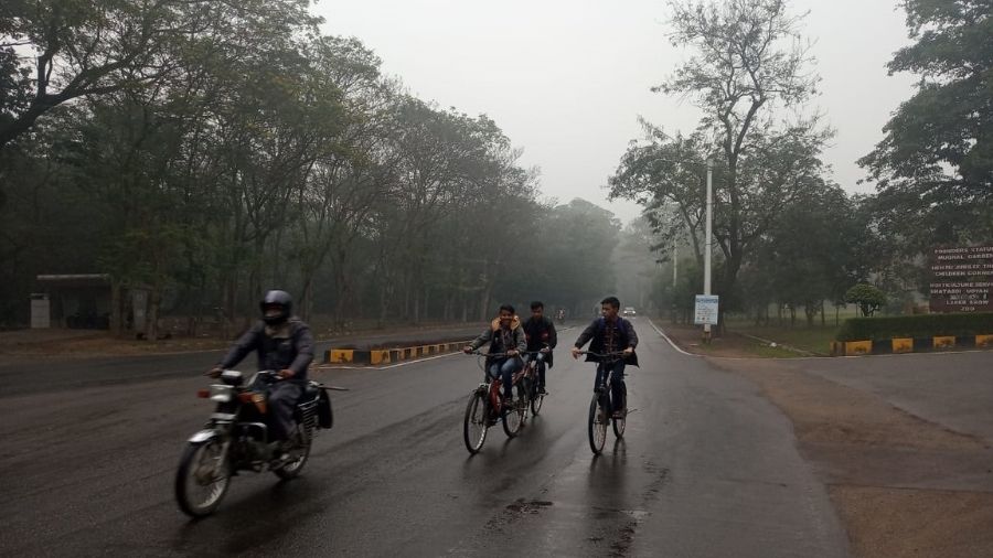Commuters caught in the rain at Jamshedpur on Thursday.
