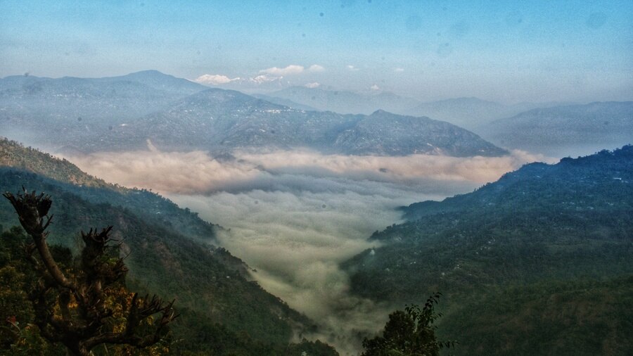 Kharka valley and the stream of clouds on a misty morning