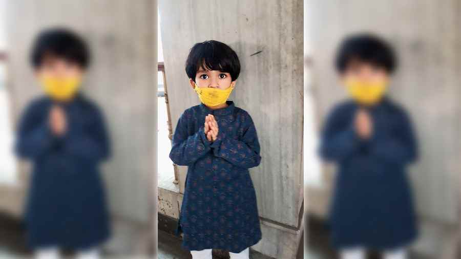 Little Rishan Roy all dressed up for puja at Bidhannagar Ramakrishna Vivekananda School 