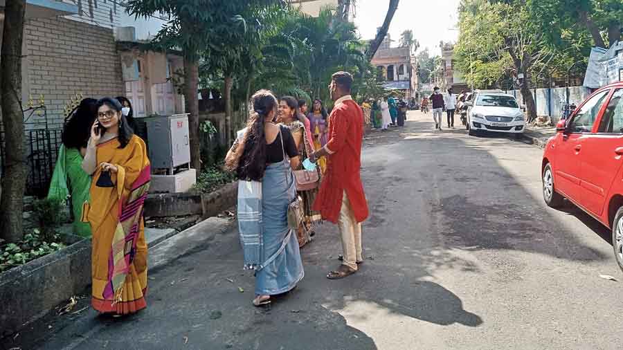 Students mingle outside Bidhannagar Government High School after Saraswati puja
