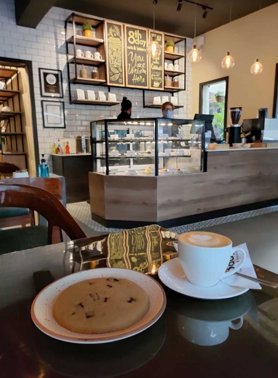 With delicious sandwiches, bagels and breakfast numbers on the menu, the cafe stays true to its culinary mission. If you’re stopping by anytime soon, the first thing you should order is a steaming hot cuppa along with their signature cookies that are as big as your face!