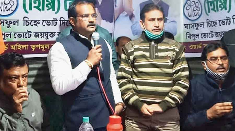 Trinamul candidate Abhijit Dey Bhowmik (left) campaigns in ward 16 of Cooch Behar on Friday.
