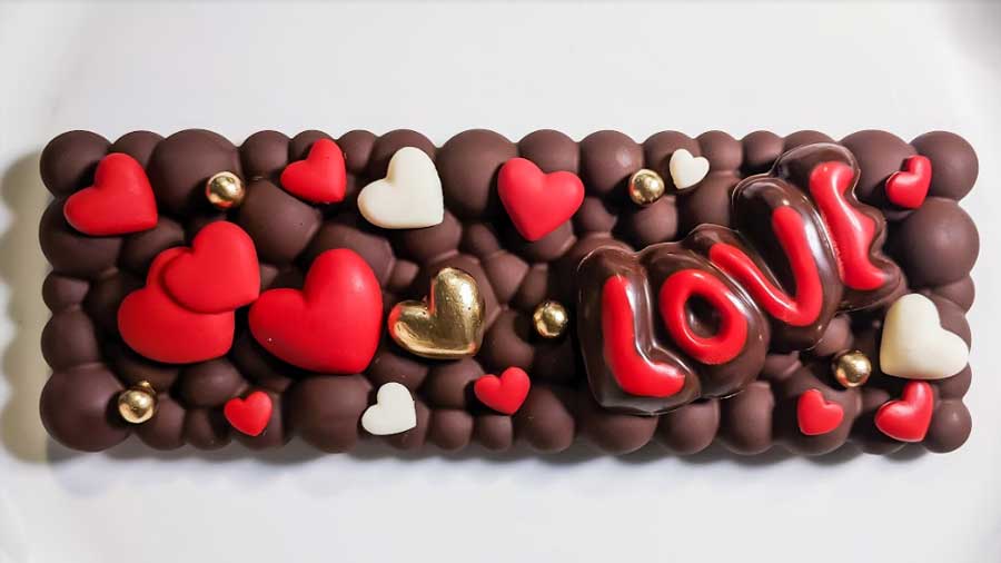 Raise the bar with a Love Bar! Almonds enveloped with chocolate will express your feelings and your partner is sure to go nuts!