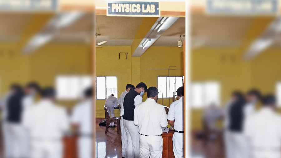 Students in the physics  lab of Jadavpur Vidyapith  on Tuesday