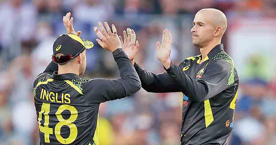 Australia’s Ashton Agar (right) celebrates with Josh Inglis after dismissing Sri Lanka’s Kusal Mendis  in Canberra on Tuesday. 