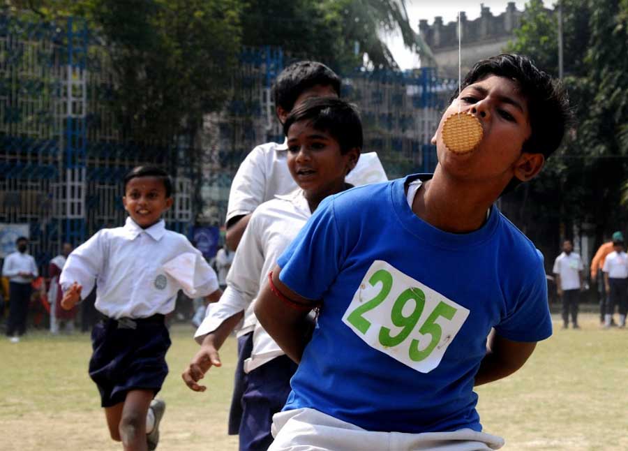 Students take part in an annual sports day event at Shyambazar AV School in north Kolkata on Friday 