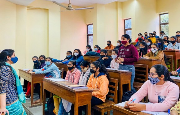 A class in progress at Miranda House College, Delhi. The colleges recorded good attendance and professors hoped more students would join next week.
