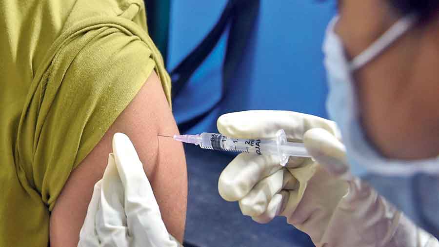 A man gets vaccinated against Covid at a  health centre in Kalighat.  