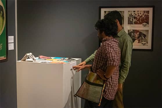 Visitors admire artefacts from the Satyajit Ray Centenary Show collection.