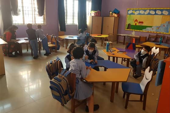 Meeting their school friends in classrooms for the first time, the children had a lot of stories to share with each other.