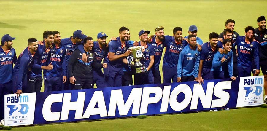 The Indian team pose with their trophy after defeating West Indies in the third and final match of the T20I series at the Eden Gardens on Sunday. The Men in Blue beat West Indies by 17 runs on Sunday to complete a 3-0 series win