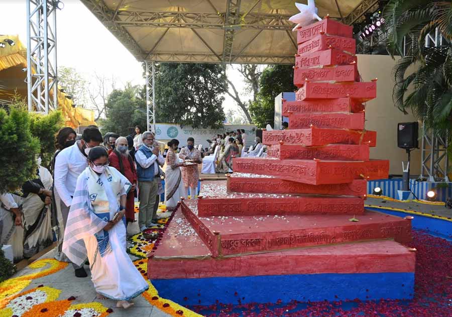 Chief minister Mamata Banerjee and other guests at a programme to mark International Mother Language Day at Deshapriya Park on Monday