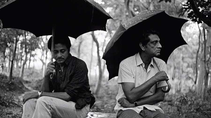 Soumendu Roy and Satyajit Ray. Roy worked in 21 films made by Ray