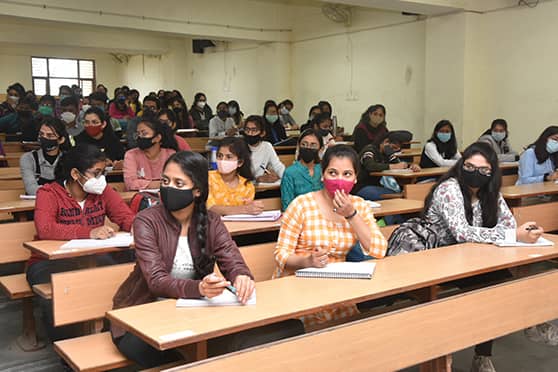 BHU students attend offline classes.