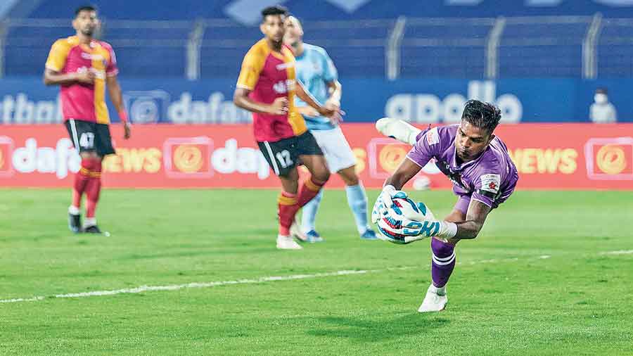SC East Bengal goalkeeper Sankar Roy makes a save during the match against Mumbai City on Tuesday.
