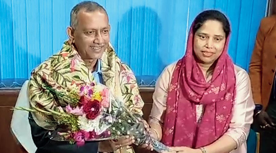 Siliguri’s new mayor Gautam Deb receives a bouquet from minister Sabina Yeasmin on Tuesday. 