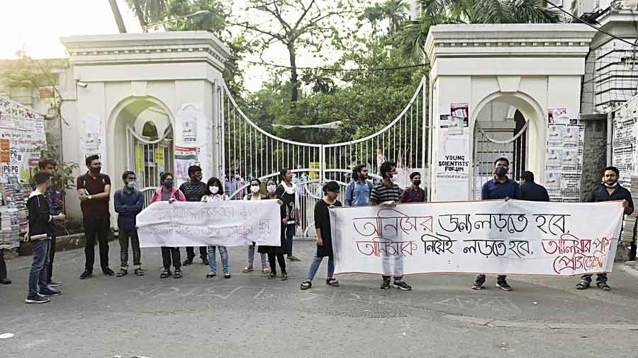 Presidency University students protest in front of the institute’s gate on College Street on Tuesday evening.