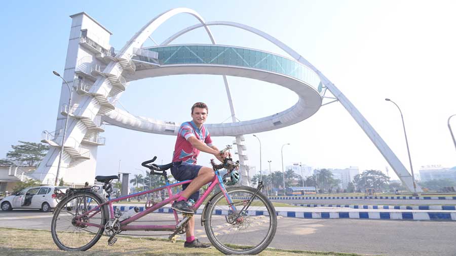 Luke poses by the Biswa Bangla Gate 