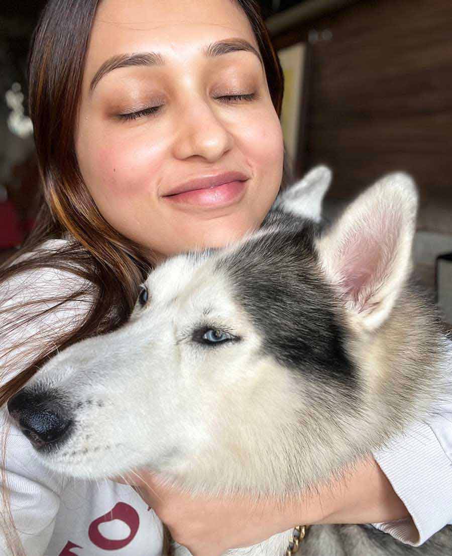 Actor turned politician Mimi Chakraborty showers one of her four-legged friends with love. The actor uploaded this photograph on her Facebook profile on Wednesday 