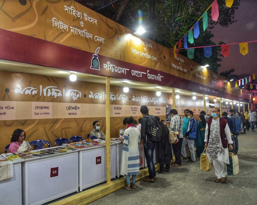 Visitors browse through magazines at a little magazine fair organised by the Bengal government at Rabindra Sadan on Wednesday 