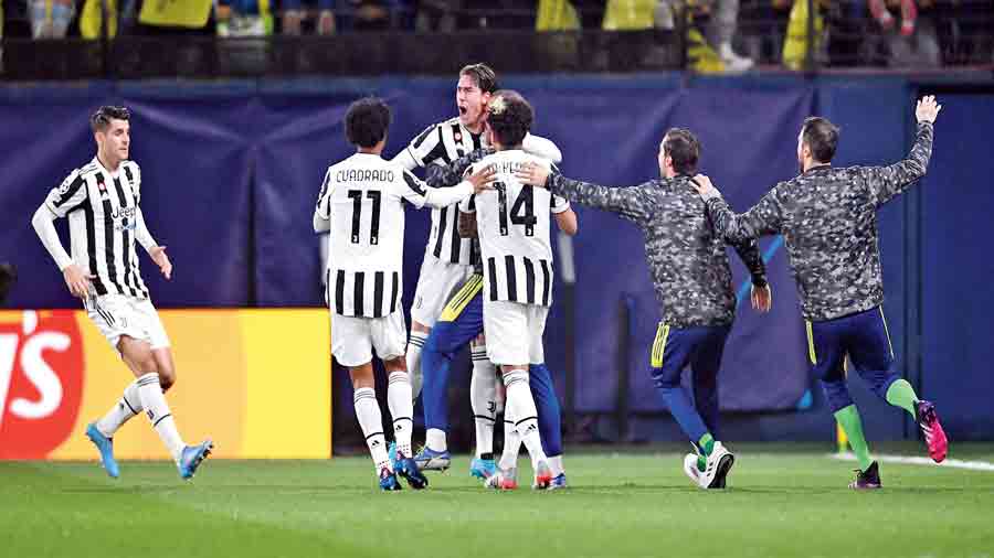 Dusan Vlahovic (centre) of Juventus with teammates after scoring against Villarreal on Tuesday.