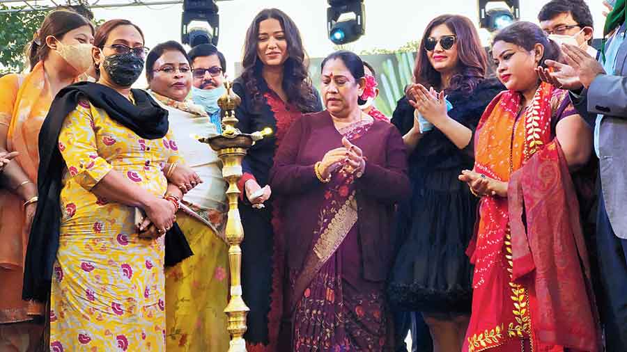Krishna Chakraborty (in sari at the centre), actresses Sohini Sarkar and Ritabhari Chakraborty to her right and left and others at the inauguration of the festival 