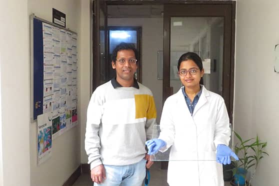 IIT Guwahati researchers with the self-healable amphiphobic solid slippery coating applied glass. 