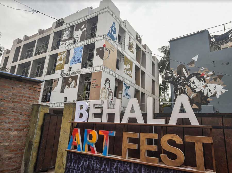 Murals drawn by artist Sanatan Dinda on the walls of a residential building in Behala on Friday. The third edition of Behala Art Fest began on Friday and will continue till Sunday