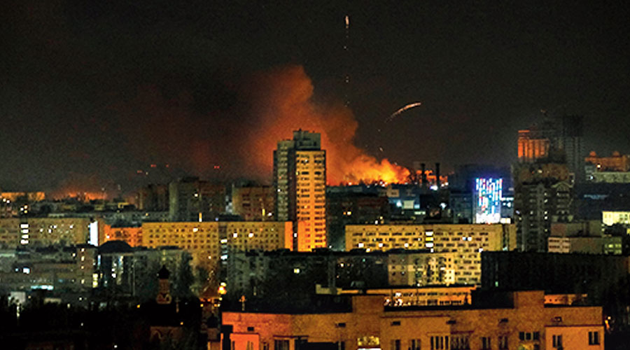 Smoke and flames rise over buildings during shelling as Russia continues its invasion of Ukraine 