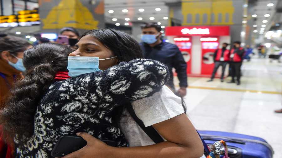 Indian nationals, evacuated from war-torn Ukraine, upon their arrival at the IGI Airport, in New Delhi, early Sunday.