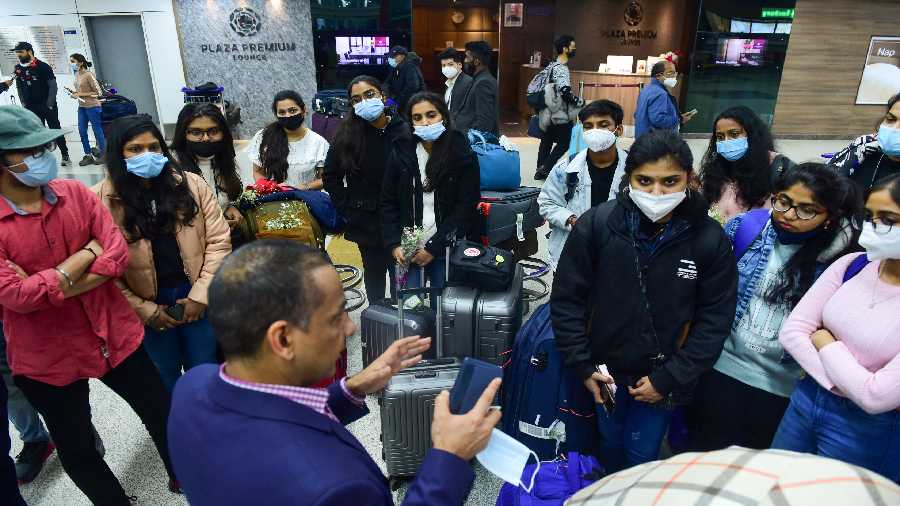  Indian nationals, evacuated from Ukraine, get briefed upon their arrival at the IGI Airport, in New Delhi on February 27.