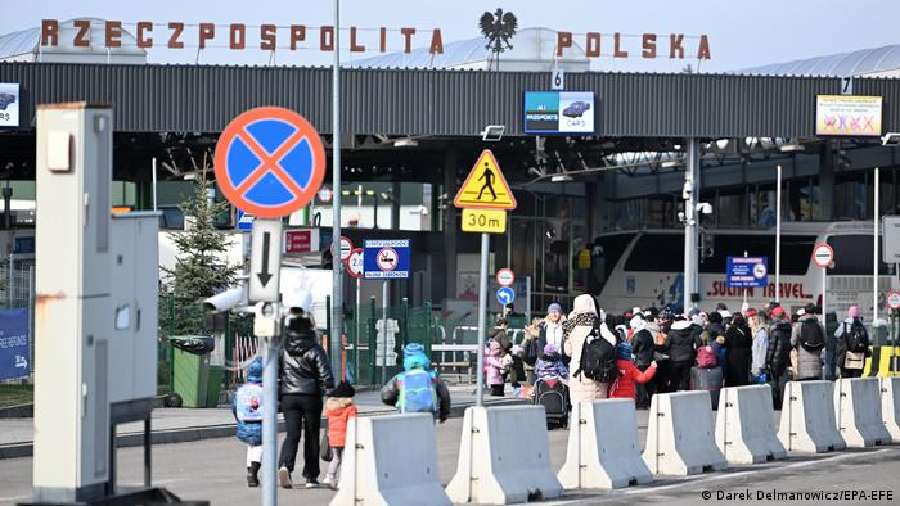 A queue builds on the Polish side of the border in Medyka.